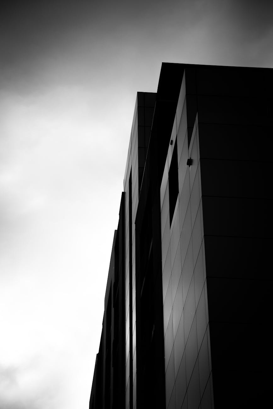 grayscale photograph of high rise building